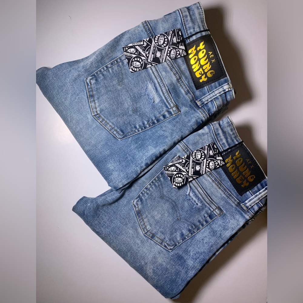 2 pairs of young money x American eagle stacked jeans